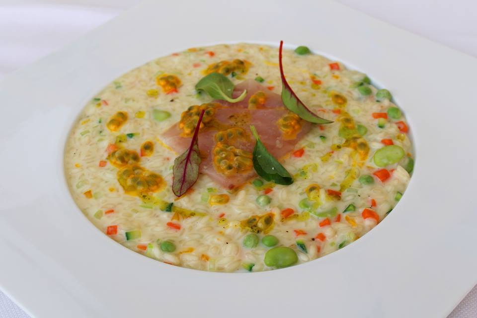 Risotto with the scents, creamy yogurt, emincèe bass, and passion fruit