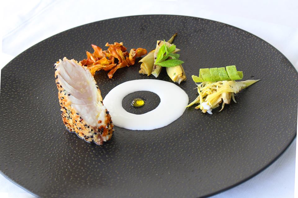 Fish in the variation of artichokes, lemongrass sauce and mint Quattro Passi Restaurant